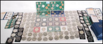A large collection of commemorative collectors coins to include Churchill Crowns, 1953 Coronation