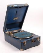 A vintage 20th Century Selecta portable picnic gramophone, in a blue leatherette carry case, turning