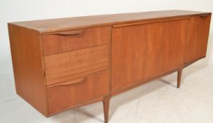 A.H. McIntosh Of Kirkcaldy - A 1960's retro vintage teak wood sideboard credenza . The unit having a
