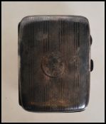 A silver hallmarked 1920's Art Deco vesta case having engine turned decoration to the exterior