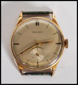 A vintage gentleman's Peerex antimagnetic wrist watch a round champagne dial having baton markings