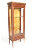 A 20th Century French mahogany display cabinet / vitrine in the manner of Vernis Martin. The cabinet
