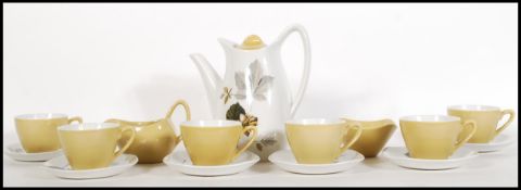 A mid 20th Century 1960's coffee service by Midwinter Stylecraft in the Nuts In May pattern designed