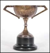 An early 20th Century silver hallmarked Art Deco trophy having triangular geometric handles.