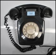 A vintage 1970's  local interest black wall mounting dial telephone model 741 GNA 72/1 being