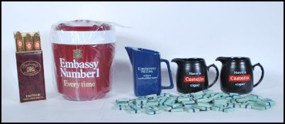 A collection of 20th century breweriana items to include Embassy Number 1 Ice bucket, Have A