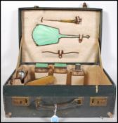 A 1930's silver and enamel hallmarked ladies vanity travel suitcase. The case to include glass