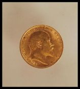 A Edward VII 1910 gold half sovereign coin with bust Front, St George & Dragon verso. Total weight