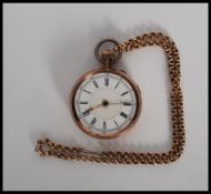 A 9ct gold hunter pocket watch having enamel face with roman numerals to the chapter, crown winder
