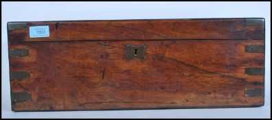 A 19th Century Victorian brass bound writing slope box. The box with secret drawer having a rosewood