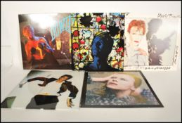 A collection of long play LP vinyl records by David Bowie to include Lodger, Hunky Dory, Scary