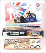 THREE BOXED SCALEXTRIC SLOT CAR RACING SETS