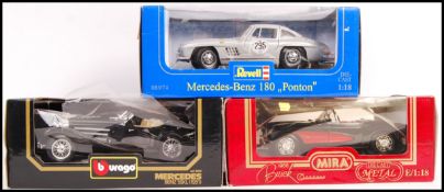 THREE BOXED 1/18 SCALE DIECAST MODELS