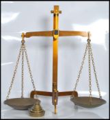A set of 19th Century Victorian large brass balance grocers pan scales possibly by W.T. Avery raised