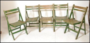 A set of five vintage village hall / garden folding dispersal chairs, slated seat pads and back