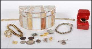 A small collection of vintage costume jewelry to include rings, bracelets, necklace, small brooches.
