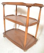A vintage 20th century Ercol Golden Dawn 3 tier bu