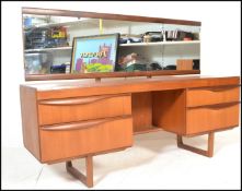 A 1970's teak wood dressing table in the manner of Mogens Kolo / EON - Elliotts of Newbury. The teak