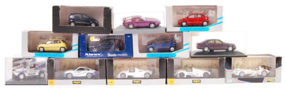 COLLECTION OF 12 1/43 SCALE DIECAST MODELS.