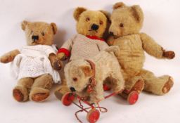 GROUP OF FOUR VINTAGE MERRYTHOUGHT TEDDY BEARS