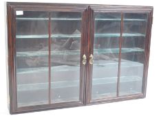 STAINED WOOD AND GLAZED TWIN DOOR DIECAST DISPLAY CABINET