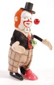 RARE 1940'S SCHUCO CLOCKWORK CLOWN WITH JUGGLING BALLS
