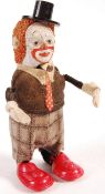 RARE 1940'S SCHUCO CLOCKWORK CLOWN WITH JUGGLING BALLS