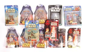 COLLECTION OF ASSORTED CARDED STAR WARS ACTION FIG