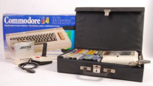 BOXED VINTAGE COMMODORE 64 WITH GAMES AND ACCESSORIES