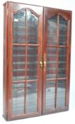 STAINED WOOD AND GLAZED TWIN DOOR DIECAST DISPLAY CABINET