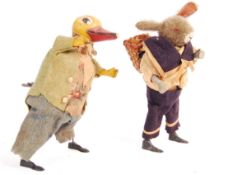 PAIR OF 19TH CENTURY FRENCH CLOCKWORK TOYS
