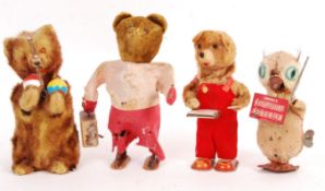 COLLECTION OF FOUR VINTAGE CLOCKWORK TOYS