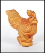 A 20th century Japanese boxwood Netsuke in the for