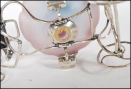 A stamped 925 silver ornament in the form of a cin