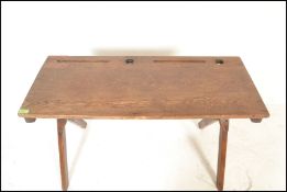 An early 20th Century vintage folding double schoo