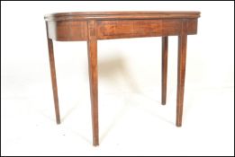 A 19th Century Georgian mahogany line inlay demi l