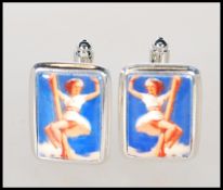 A pair of contemporary gentlemans silver and ename