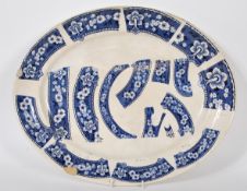 A early 20th Century blue and white meat plate tri