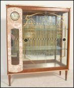 A vintage retro glass fronted mirror back cocktail