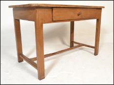 A 19th century French fruitwood  dining table. Rai