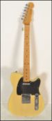A six string electric guitar Telecaster style by F