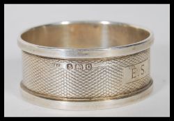 A collection of silver napkin rings to include an