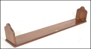 An early 20th Century large metamorphic mahogany b