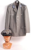 POST WWII GERMAN SOLDIERS UNIFORM JACKET AND CAP