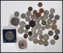 A small collection of pre 1947 and later coins dating from the late 19th Century to include