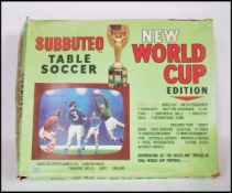 A vintage 20th Century boxed Subbuteo table soccer New World Cup Edition to include International