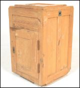 An early 20th Century 1920's icebox meat refrigerator of pine panel construction having hinged lid