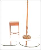A mid 20th Century standard lamp together with two framless wall mirrors and work / sewing box