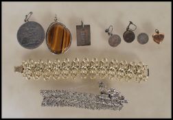 A small collection of vintage costume jewellery and silver jewellery items dating from the 19th
