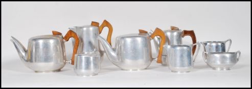 Two set of vintage stainless steel picquot ware tea sets to include to include two tea pot, hot